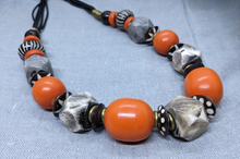 Load image into Gallery viewer, Chic necklace &quot;Afrique&quot; made of African amber beads, glass beads, cow bone beads, brass beads - UNIKAT
