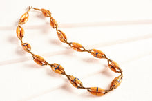 Load image into Gallery viewer, Short necklace with elongated paper beads in bundles &quot;Senta&quot;
